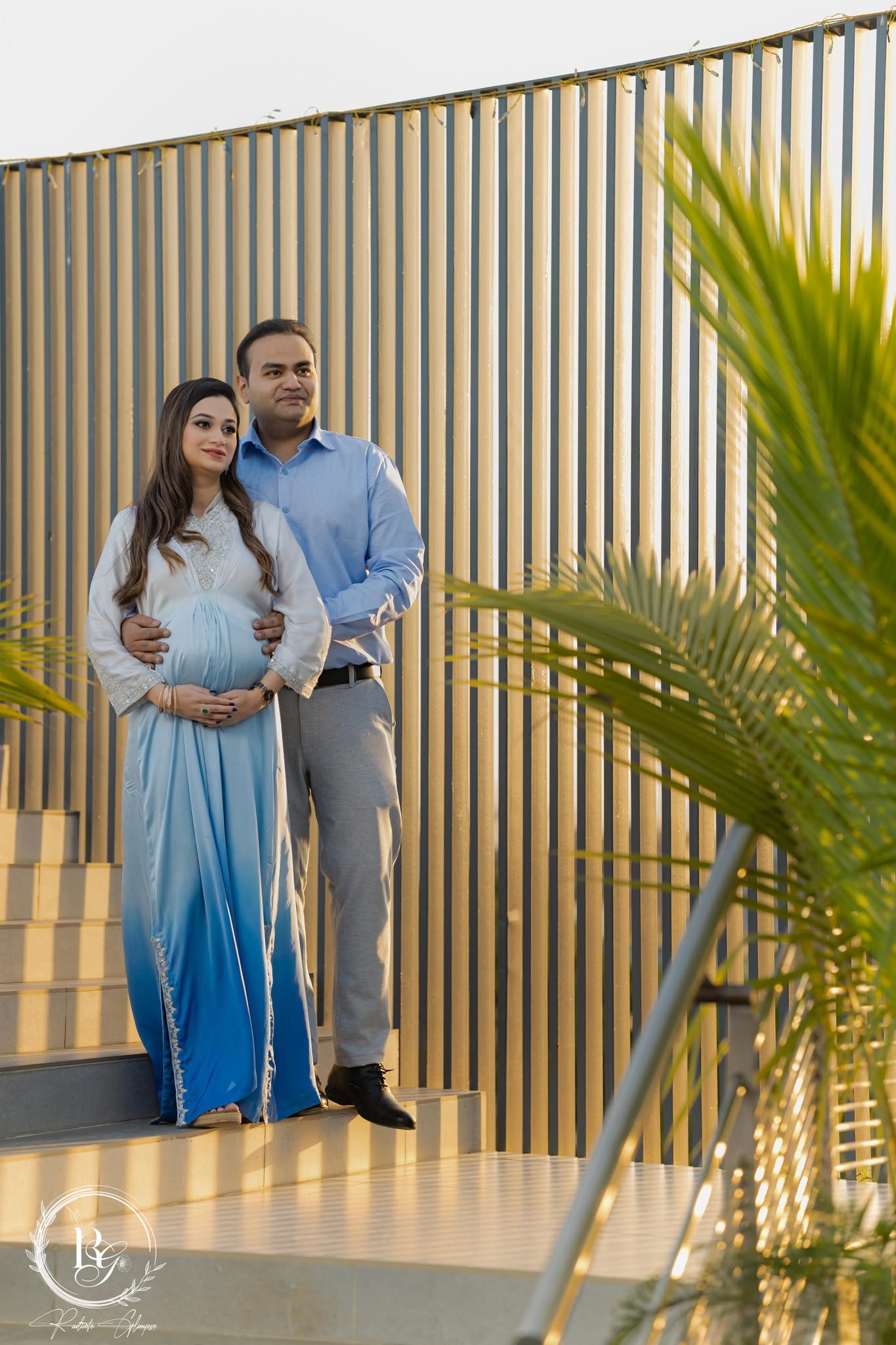 Couple maternity portrait at golden hour